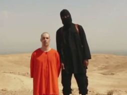 Husein, vestido con un traje naranja, señala que operaba en el norte de la provincia septentrional siria de Alepo. AP / ARCHIVO