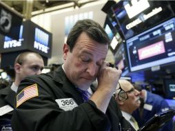 Ante una nueva caída del petróleo en mercados internacionales, Wall Street tuvo pérdidas. AP / ARCHIVO