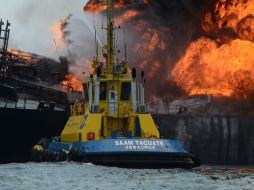 Personal especializado de las instancias referidas trabajan para evaluar los daños. EFE / L. Monroy