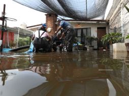 El agua pluvial en la delegación alcanzó niveles superiores a los 60 centímetros de alto. SUN /  F. Ramírez