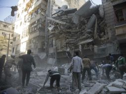 Decenas de personas fueron atendidas por problemas respiratorios, tos y enrojecimiento de ojos y piel. AFP / K. Al-Masri