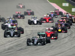 Acción del Gran Premio de Malasia disputado el año pasado, el cual fue ganado por Sebastian Vettel, de la escudería Ferrari. AP / ARCHIVO
