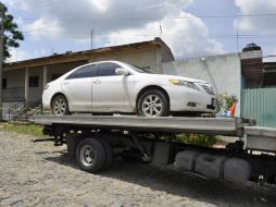 Además, son asegurados otros dos vehículos para determinar si cuentan con alguna irregularidad. ESPECIAL / Fiscalía General del Estado