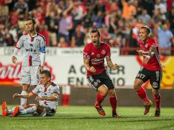 Los de Tijuana festejan el gol de Milton Caraglio. MEXSPORT / Emiliano