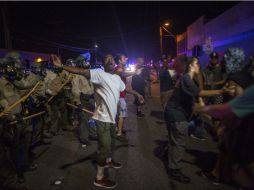 La concentración, inició en el Parque Prescott Promenade, y marca el quinto día consecutivo de manifestaciones por el caso. AFP / D. McNew