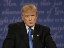 Trump dice que no hay posibilidad de que renuncie, y que no se dará por vencido, pues tiene ''tremendo respaldo'' electoral. AP / ARCHIVO