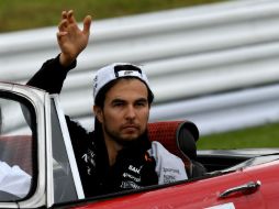 'Checo' señaló que el Gran Premio de Japón fue una carrera divertida y con presión. AFP / T. Kitamura