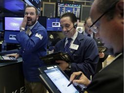 El Nasdaq Composite también inicia operaciones con un descenso de 13.95 puntos. AP / ARCHIVO