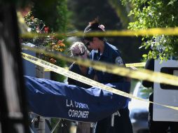 Los policias aún investigan en las localidades donde sucedieron los hechos. AFP / M. Rarlston