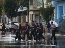 Advierten sobre intervalos de chubascos como el que sorprendió ayer por la tarde a varios jaliscienses. EL INFORMADOR / ARCHIVO