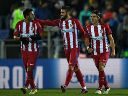 Yannick Carrasco (C) celebra su tanto, con el cual su equipo obtuvo una victoria apretada. AFP / K. Kudryavtsev