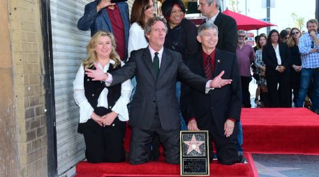 Vestido con un elegante traje gris, Laurie señaló que recibir el reconocimiento era 'francamente abrumador'. AFP / F. Brown