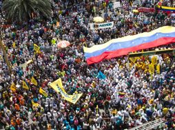 La oposición venezolano convocó a una marcha multitudinaria en contra del gobierno de Maduro. AFP /