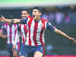 Alan Pulido celebra el gol con el que su equipo igualó el marcador durante el tiempo reglamentario ante las Águilas. MEXSPORT /