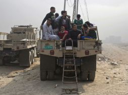 Desde el inicio hace once días de la operación para liberar Mosul, al menos ocho mil 940 personas han huido. AP / M. Drobnjakovic