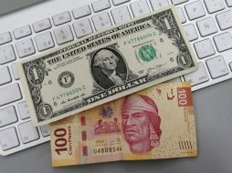 Al quedar el dólar en 19.21 pesos, esto significó un avance respecto a la jornada previa. NTX / ARCHIVO