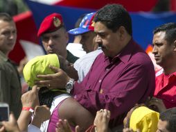 Ante miles de seguidores, Maduro anunció que demandará ante la justicia a la mayoría opositora. AP / A. Cubillos