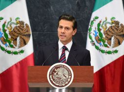 Enrique Peña Nieto señaló a Mariano Rajoy que México seguirá estando muy cerca de España. AFP / ARCHIVO