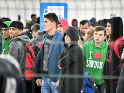 Unos 30 autobuses llenos de menores partirán desde 'La Jungla' hacia los centros de acogida. AFP / P. Huguen