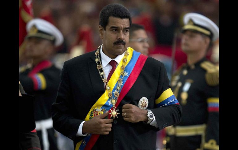 Maduro fue envestido Presidente en 2013 tras ganar por un estrecho margen al opositor Capriles. AFP / ARCHIVO