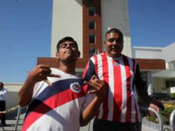 Un par de seguidores del Rebaño llegó a la ciudad de los Gallos por medio del ''aventón'' que les dio el chofer de un tráiler. EL INFORMADOR / M. A. Vargas