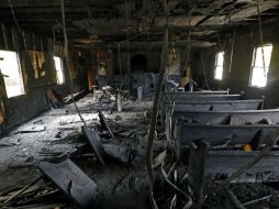 El fuego afectó particularmente el santuario de la centenaria iglesia. AP / R. Solis