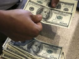 La moneda nacional a perdido ganancia frente al dólar. AP / ARCHIVO