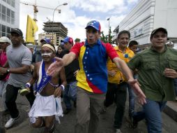 Capriles insta a luchar para lograr que se reactive el proceso para un referendo revocatorio presidencial. AP / ARCHIVO