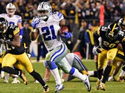 Ellliott corrió para 114 yardas y tres touchdowns, incluidos dos en los últimos dos minutos del encuentro. AP / F. Vuich