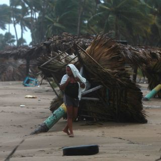 Lluvias desplazan a ocho mil personas en Dominicana