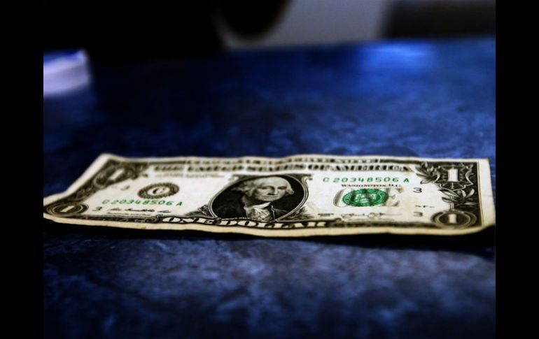 Los bancos de la Ciudad de México cotizan la compra de la divisa estadounidense en un mínimo de 19.52 pesos. EL INFORMADOR / ARCHIVO