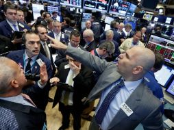 Los inversionistas estuvieron atentos a los nuevos informes. AP / ARCHIVO