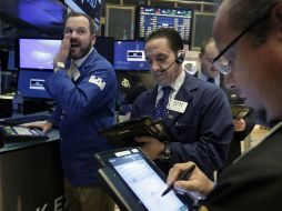 Wall Street abre temerosa por la posible alza de tasas de interés en el mes próximo. AP / ARCHIVO