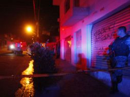 Ambos cuerpos quedaron tirados en el pavimento frente a la tienda, que hace las veces de depósito de cerveza. EL INFORMADOR / ARCHIVO