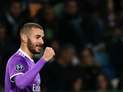 El francés apareció al final del encuentro para rescatar a un equipo gris. AFP / F. Leong