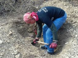 En un paraje del cerro Tenanchitla se habían exhumado los cuerpos de 12 personas del sexo masculino. EFE / CUADRATÍN