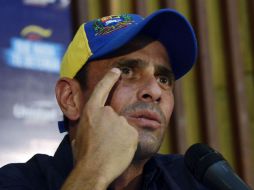 Capriles subrayó que esta es una posición individual que no compromete a la alianza Mesa de la Unidad Democrática. AFP / ARCHIVO