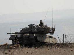Fuerzas israelíes patrullan la zona de los Altos del Golán luego de los ataques. AFP / J. Marey