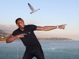 Bolt terminó el año invicto en seis finales, pese a no haber sido el número uno del ranking mundial en ninguna prueba. AFP / V. Hache