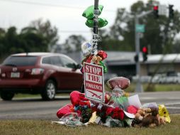 Se han dejado flores y otros objetos en Terrytown, lugar donde Joe McKnight fue asesinado. AP / G. Herbert