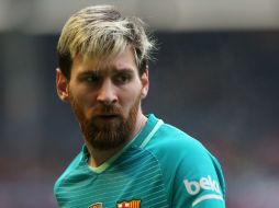 Leo Messi colabora con un ''doblete'' al triunfo, Luis Suárez hace otro tanto. AFP / C. Manso