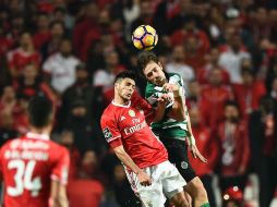 El mexicano Raúl Jiménez participó los 90 minutos del juego y ligó su encuentro marcando gol. AFP / P. De Melo
