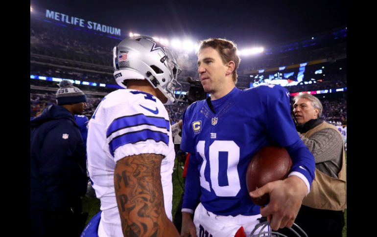 El mariscal de campo de los Gigantes, Eli Manning, mantuvo su record perfecto contra pasadores novatos. AFP / A. Bello