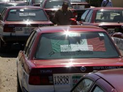 Los choferes amarraron a los sujetos a un poste, los desnudaron y cubrieron las cabezas de ambos con una playera. NTX / ARCHIVO