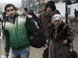 Se trata de cinco mil 992 personas, de las cuales dos mil 210 son niños. AFP / K. Al-Masri