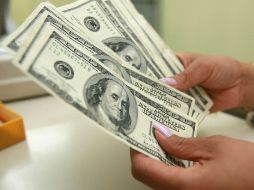 Instituciones bancarias de la Ciudad de México vendieron el dólar con una variación al alza de cinco centavos. EL INFORMADOR / ARCHIVO
