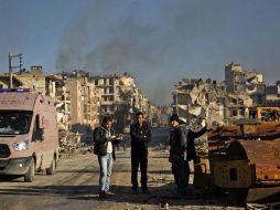 Tras el tiroteo, algunos de los ciudadanos que esperaban junto a los autobuses regresaron a sus casas. AFP / K. Al-Masri