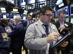 Los operadores en el parqué neoyorquino apostaron por las compras durante toda la jornada. AP / R.Drewn