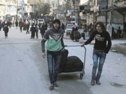 Más de 8 mil personas habían abandonado la urbe desde ayer, tras un acuerdo entre las partes para un alto el fuego y la evacuación. EFE / G. Sy