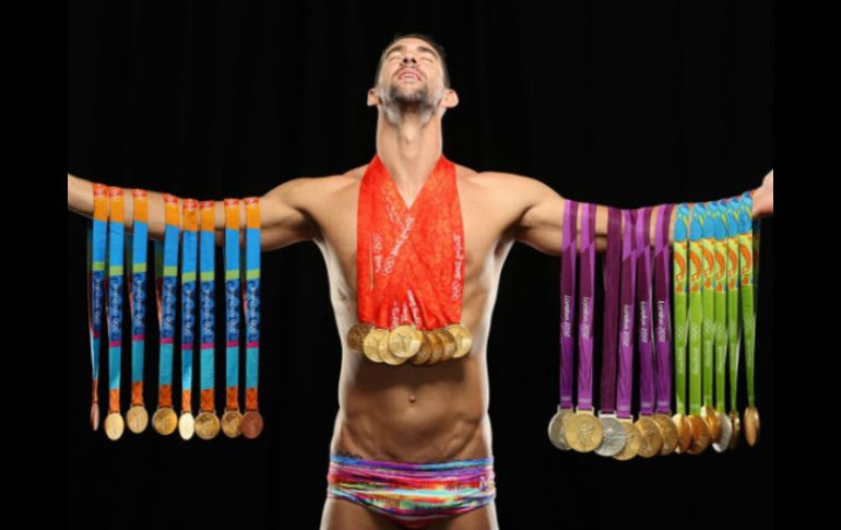 Phelps aparece con la frase 'El mejor deportista olímpico de la historia'. ESPECIAL / www.si.com